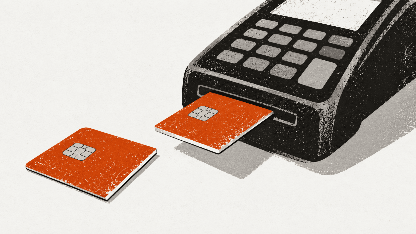 A bank card cut in half, with one half inserted into a payment terminal and the other half left lying separately on the counter.