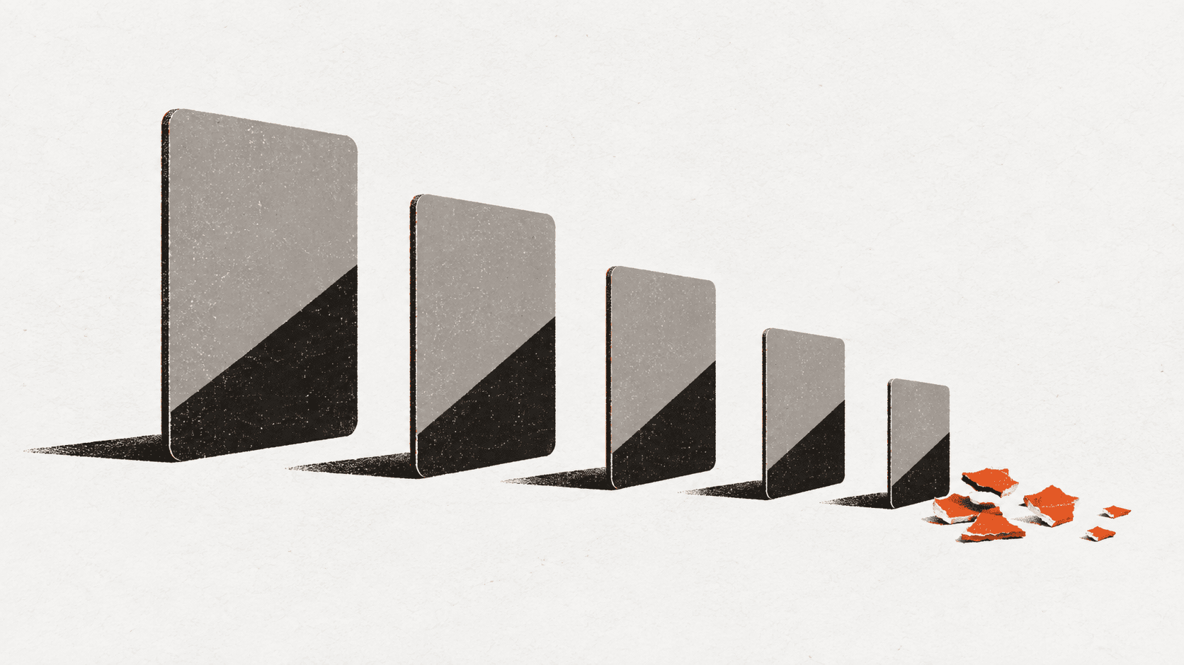 Five bank cards of steadily diminishing size stand in a row, with torn paper fragments scattered beside the smallest one at the end.