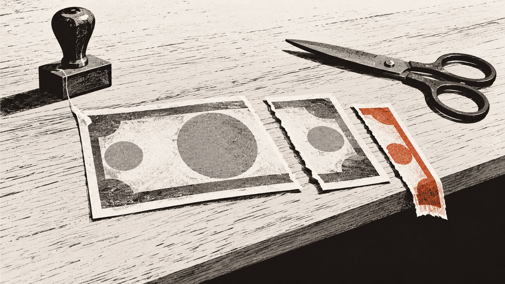 An oversized banknote cut into three unequal pieces on a table, with the smallest piece slipping off the edge into shadow.